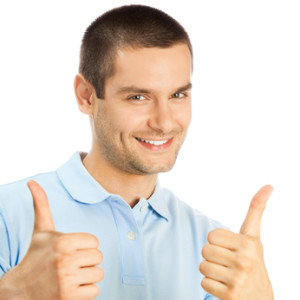 Cheerful man showing thumbs up, over white